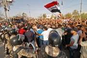 Two killed in southern Iraq as protests spread