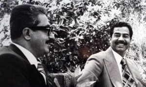Tariq Aziz with Saddam Hussein